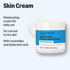Amazon Essentials cream on fingers demonstrating spreadability and hydration benefit