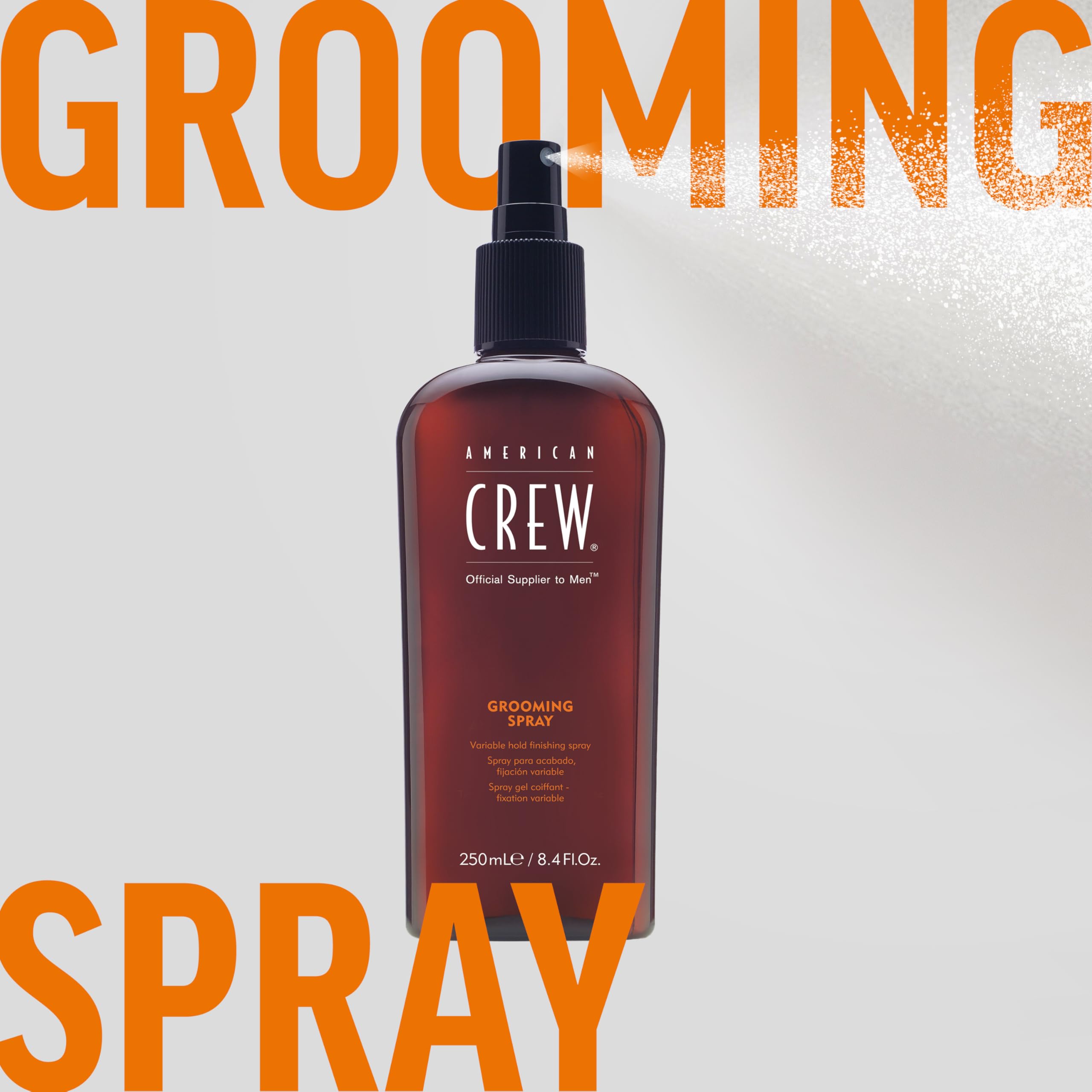 American Crew grooming spray near comb and brush to show styling compatibility
