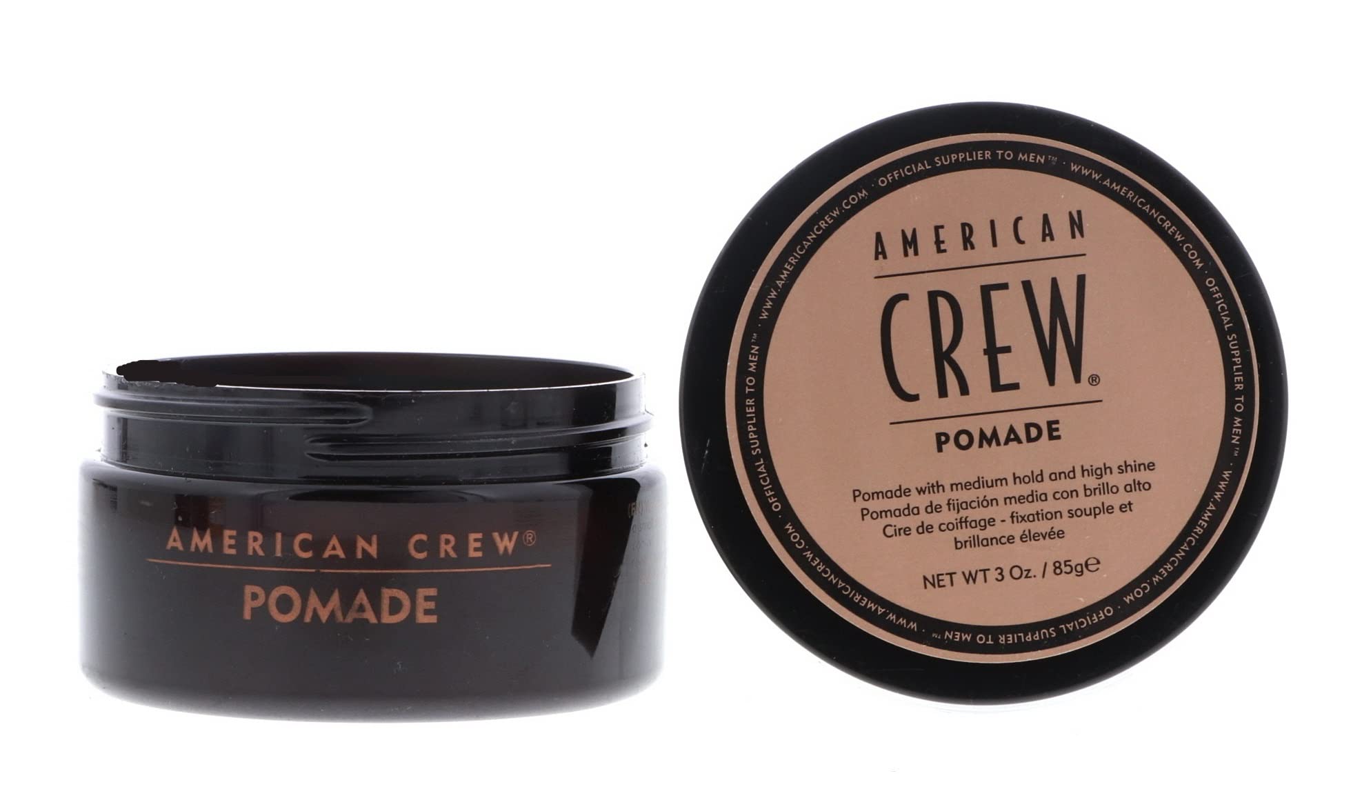 American Crew pomade being worked between hands for even distribution and control