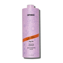 Amika front packaging 1000ml showing brand and volumizing benefit