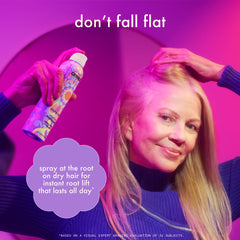 Amika fine mist texture visible in air giving lightweight root coverage