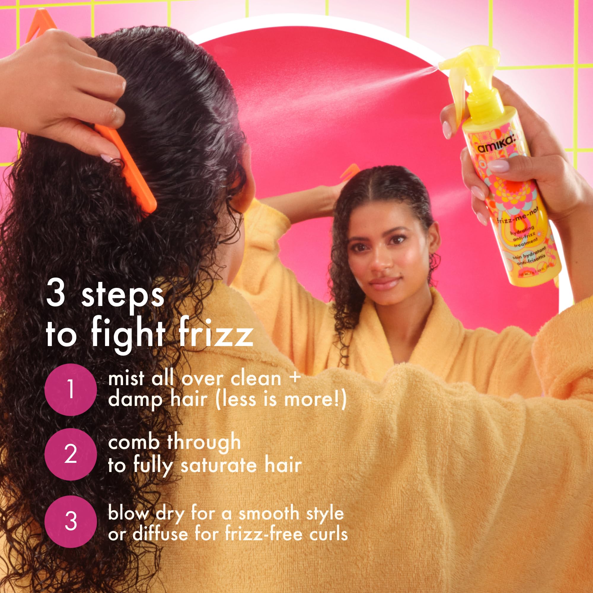 Amika being sprayed on damp hair for even distribution and better styling prep