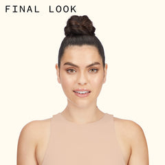 amika headstrong spray in use on an updo holding style firmly