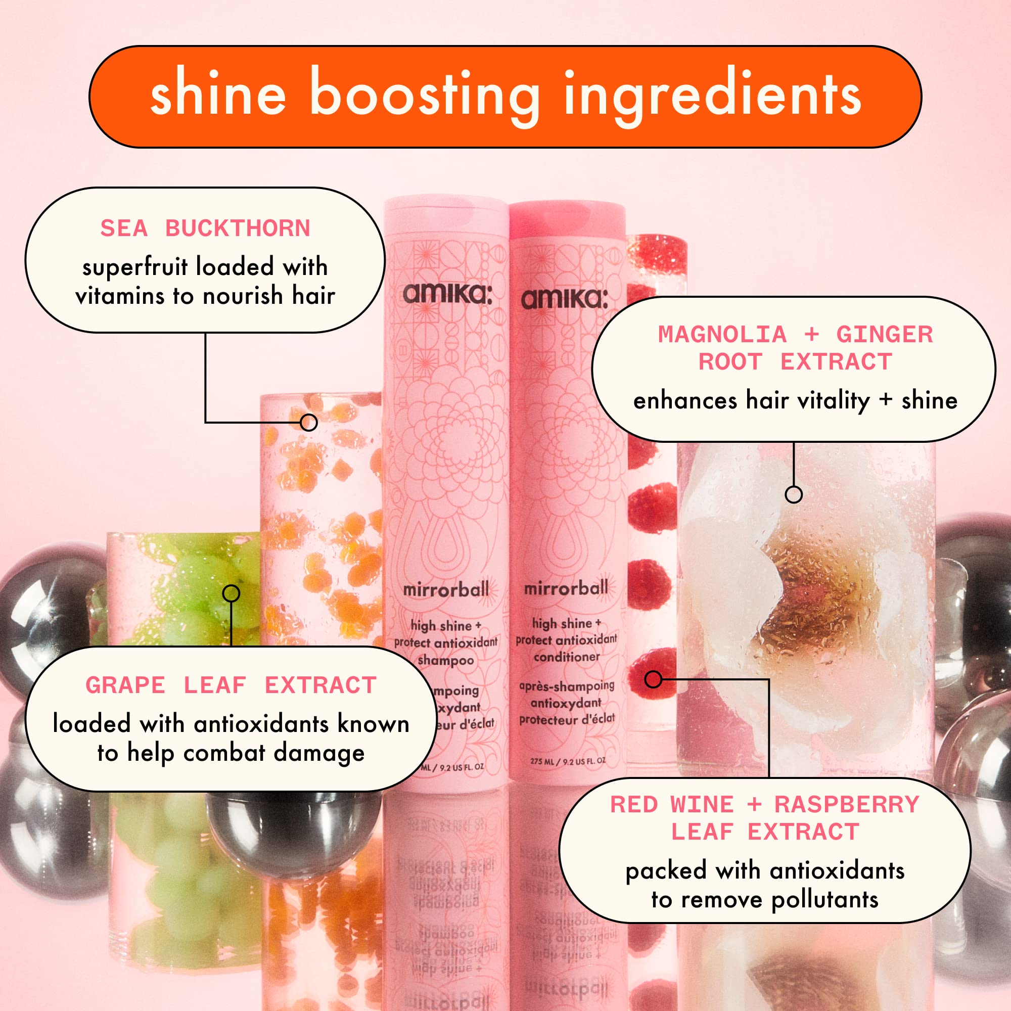 Hand holding Amika Mirrorball 500ml to show scale and ease of salon-size use