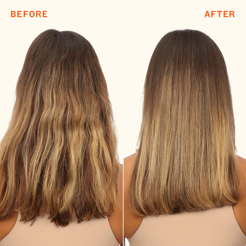 amika 275ml bottle next to a common water bottle for scale and travel clarity