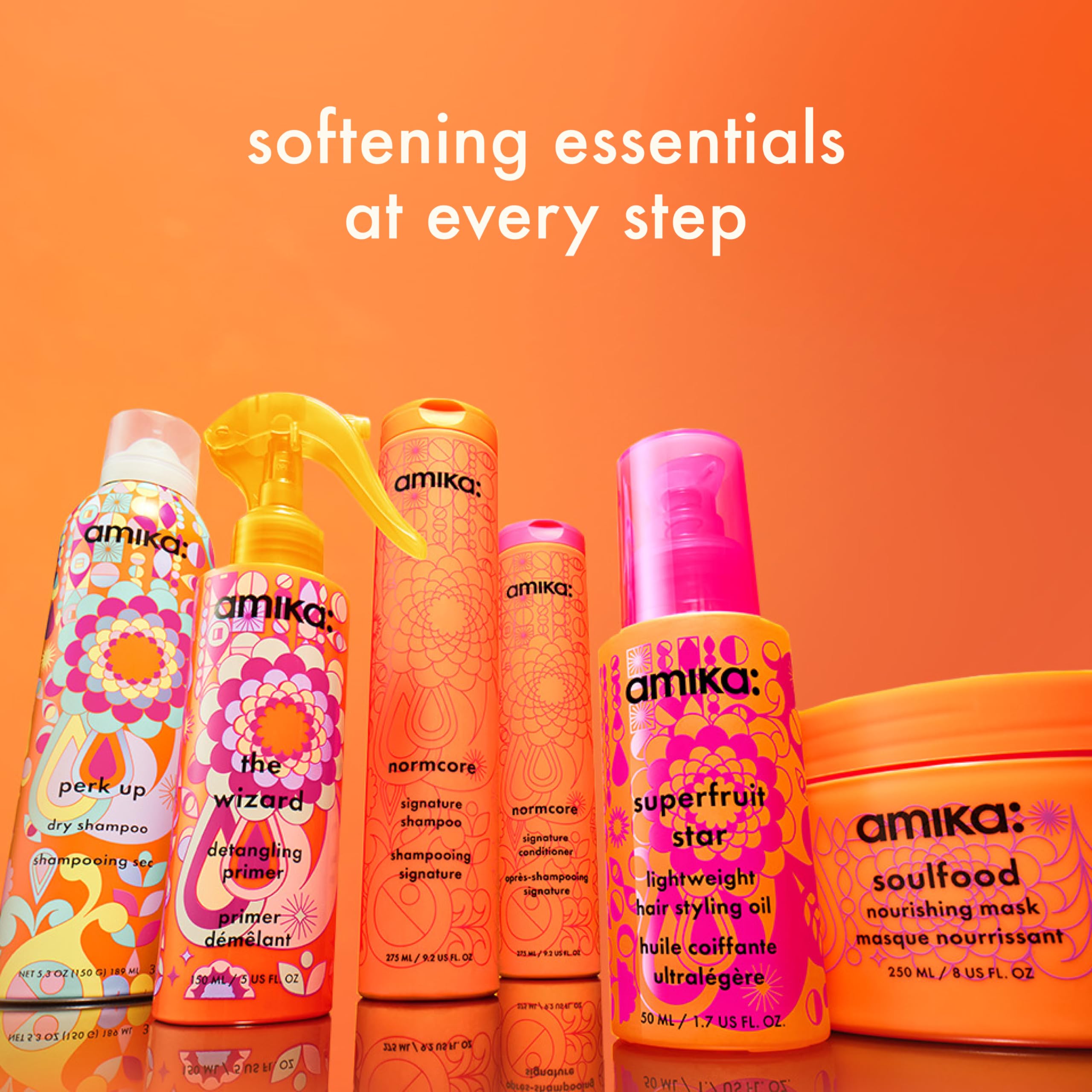 amika conditioner being applied in shower to mid-lengths showing detangling benefit