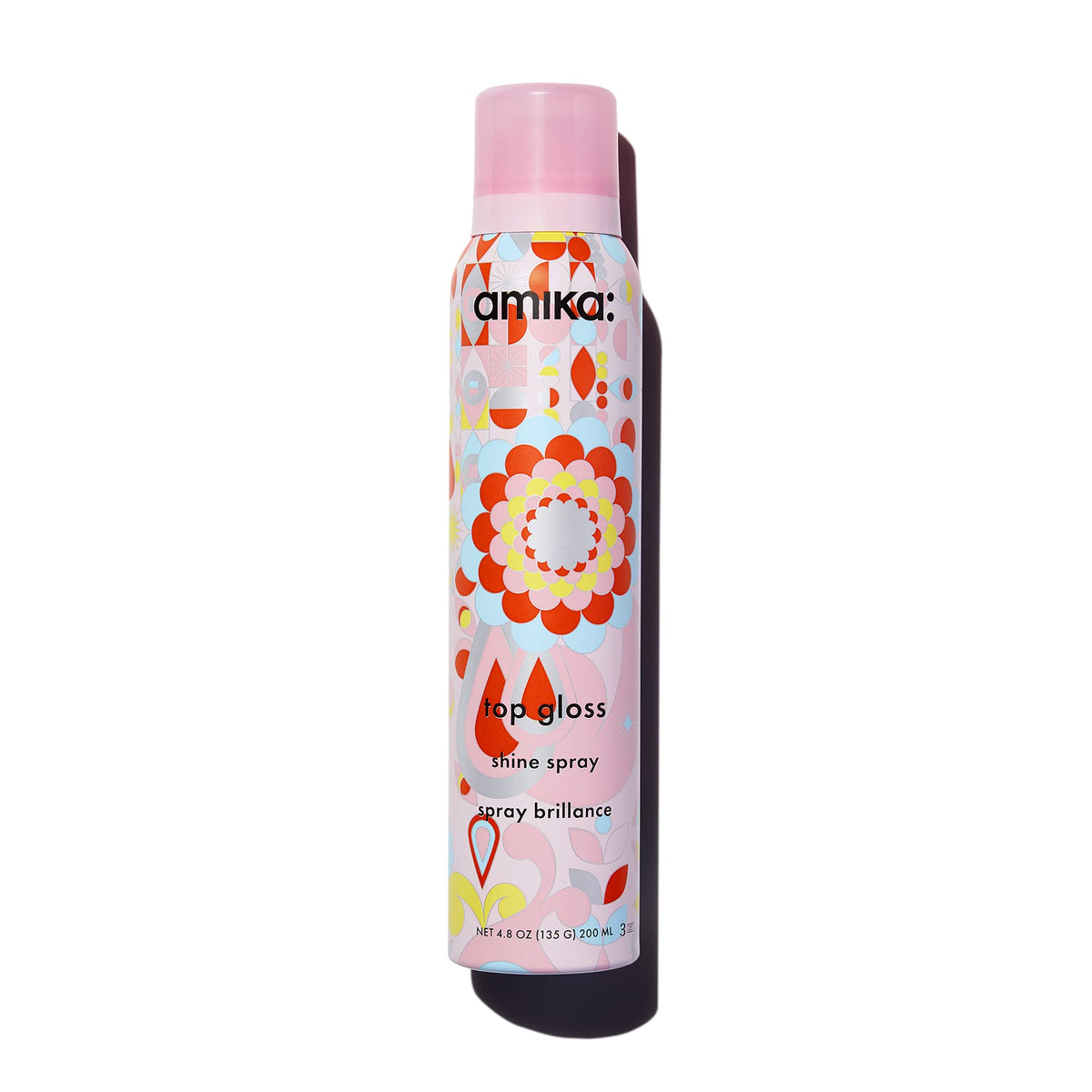 amika top gloss front packaging showing bottle and branding, highlights professional finish