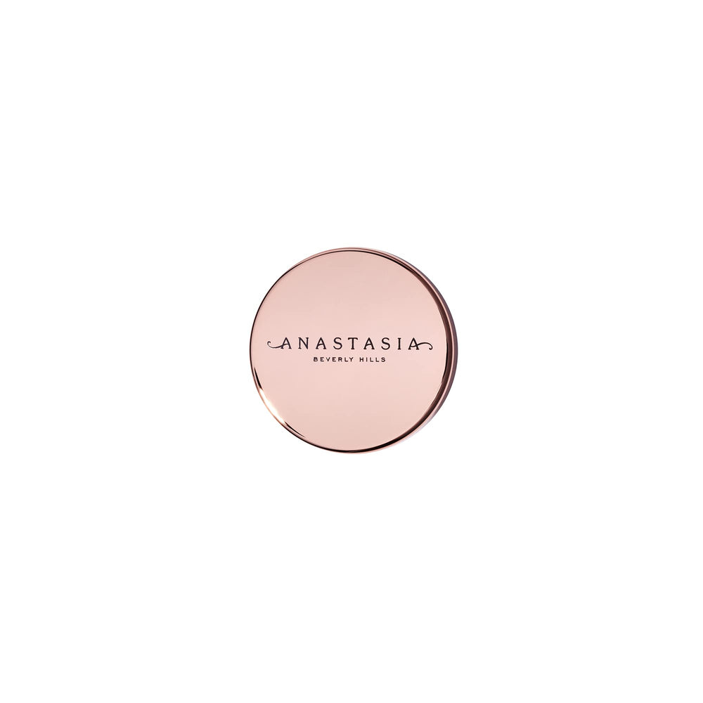Anastasia Beverly Hills spoolie brushing brows upward to achieve lifted shape