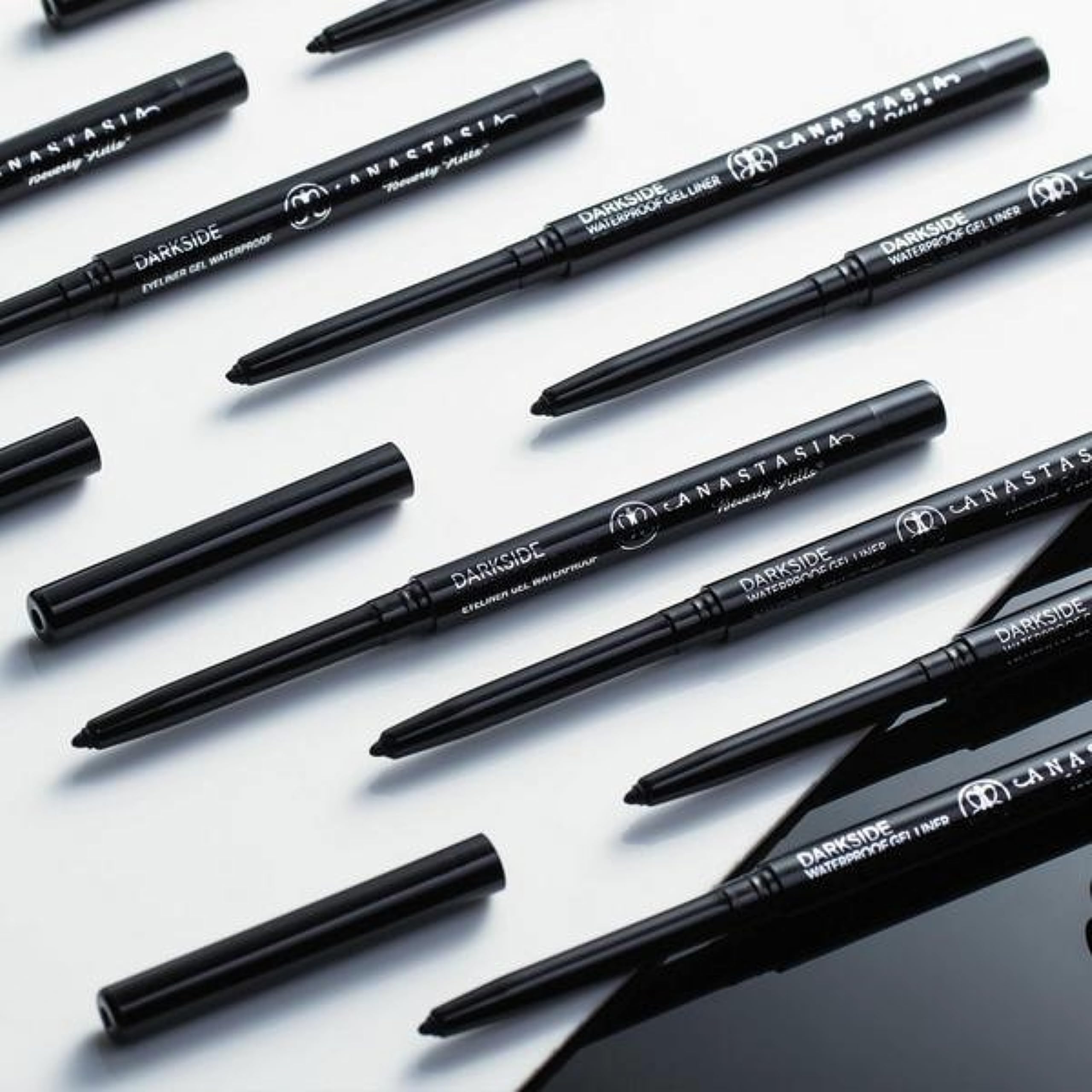 Anastasia Beverly Hills Darkside held in hand for size comparison and travel-friendly convenience