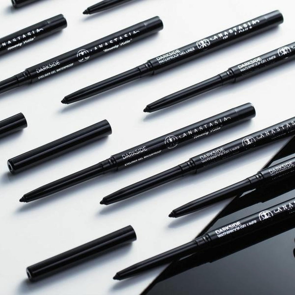 Anastasia Beverly Hills Darkside held in hand for size comparison and travel-friendly convenience