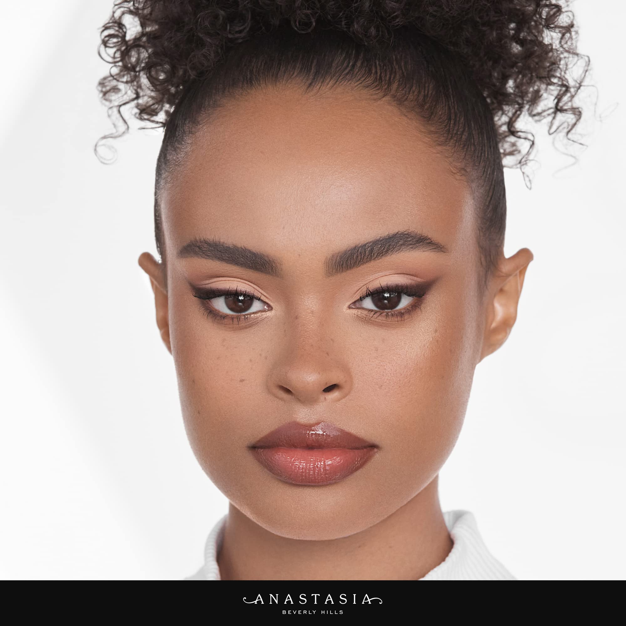 Anastasia Beverly Hills pencil held in hand to show scale and easy handling benefit