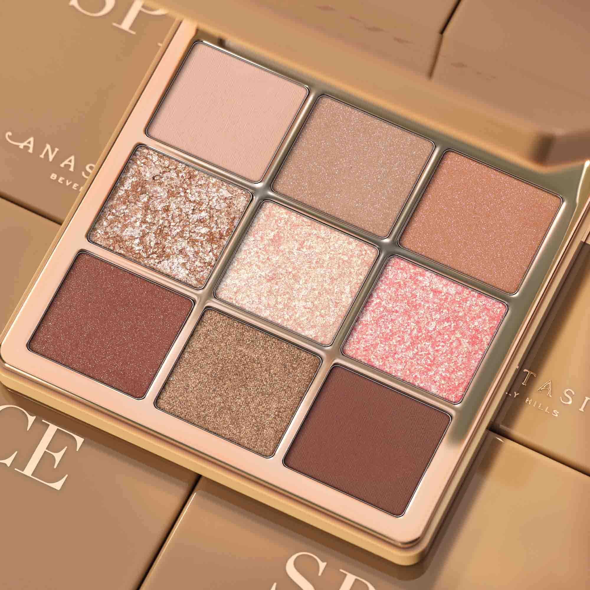 Anastasia Beverly Hills model applying warm shadows illustrating easy on-the-go application