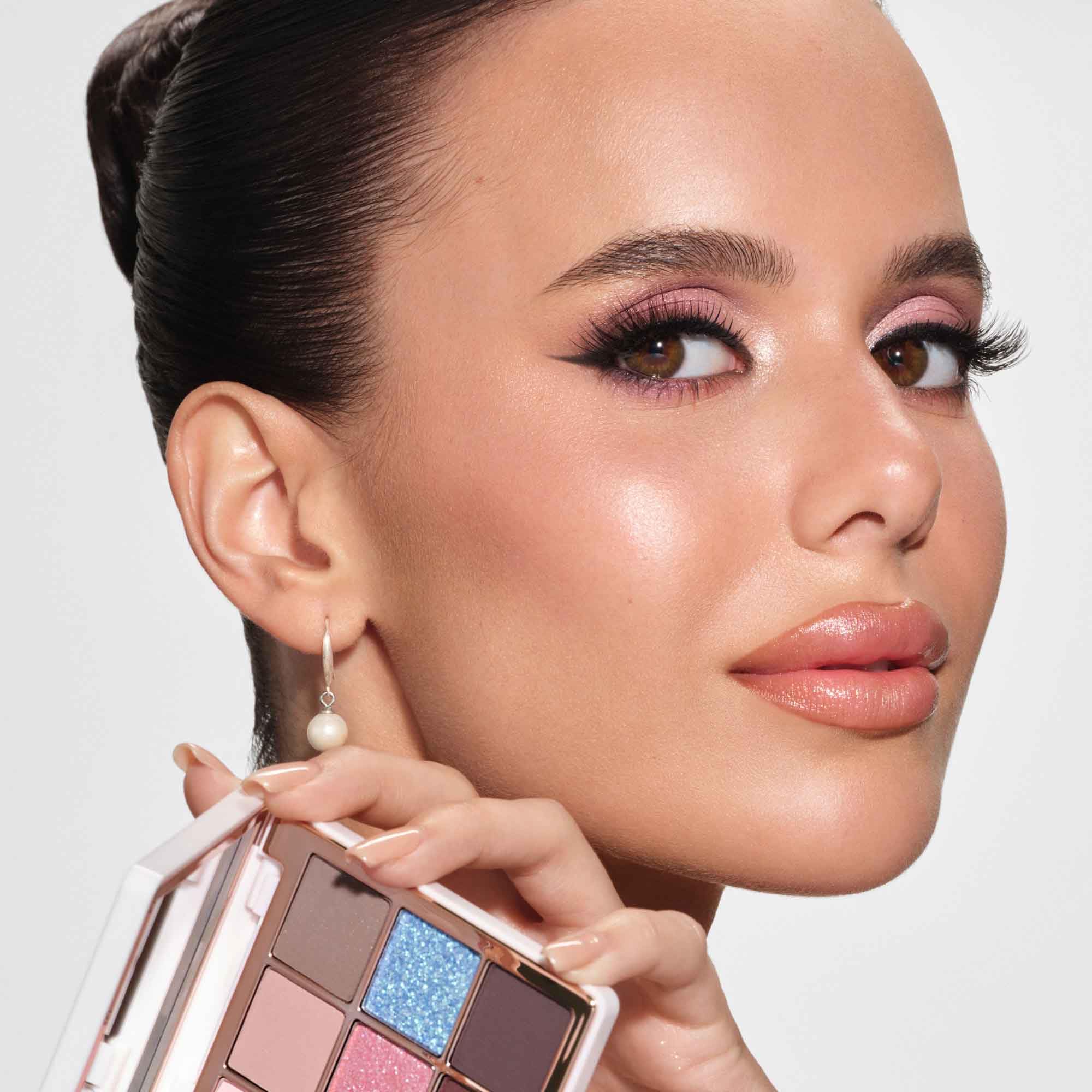 Anastasia Beverly Hills palette on vanity with brushes suggesting quick everyday application