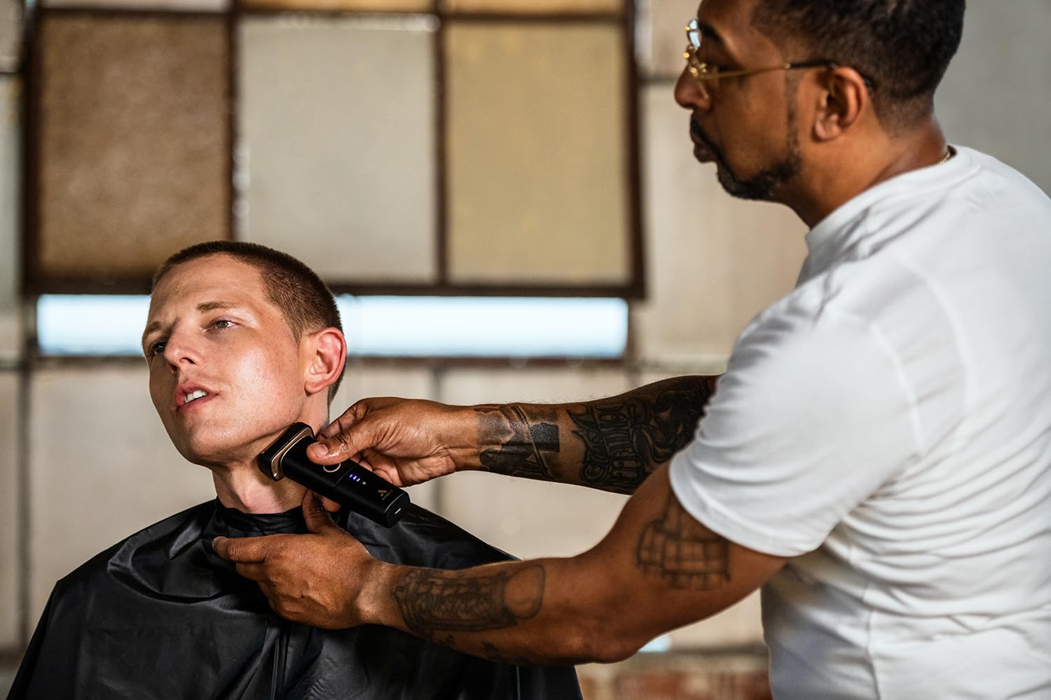 Andis Resurge installed on shaver in use demonstrating smooth wet or dry shaving
