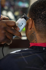 Andis T-Outliner used by barber outlining beard showing bump-free finishing benefit