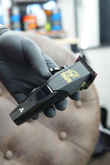 Andis Zephyr in-hand during a haircut showing steady handling and comfort