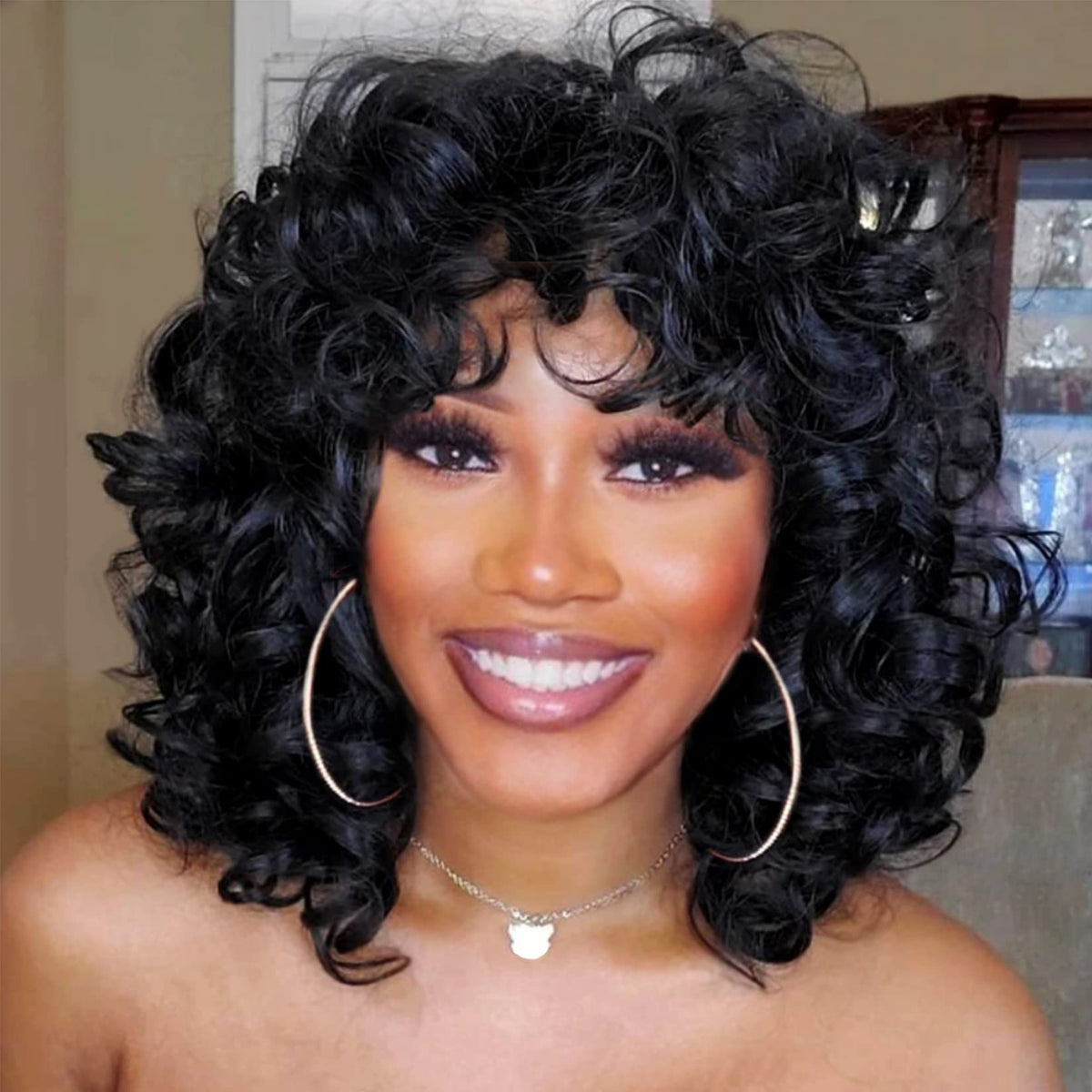 andromeda front view short curly wig with bangs showing natural framing