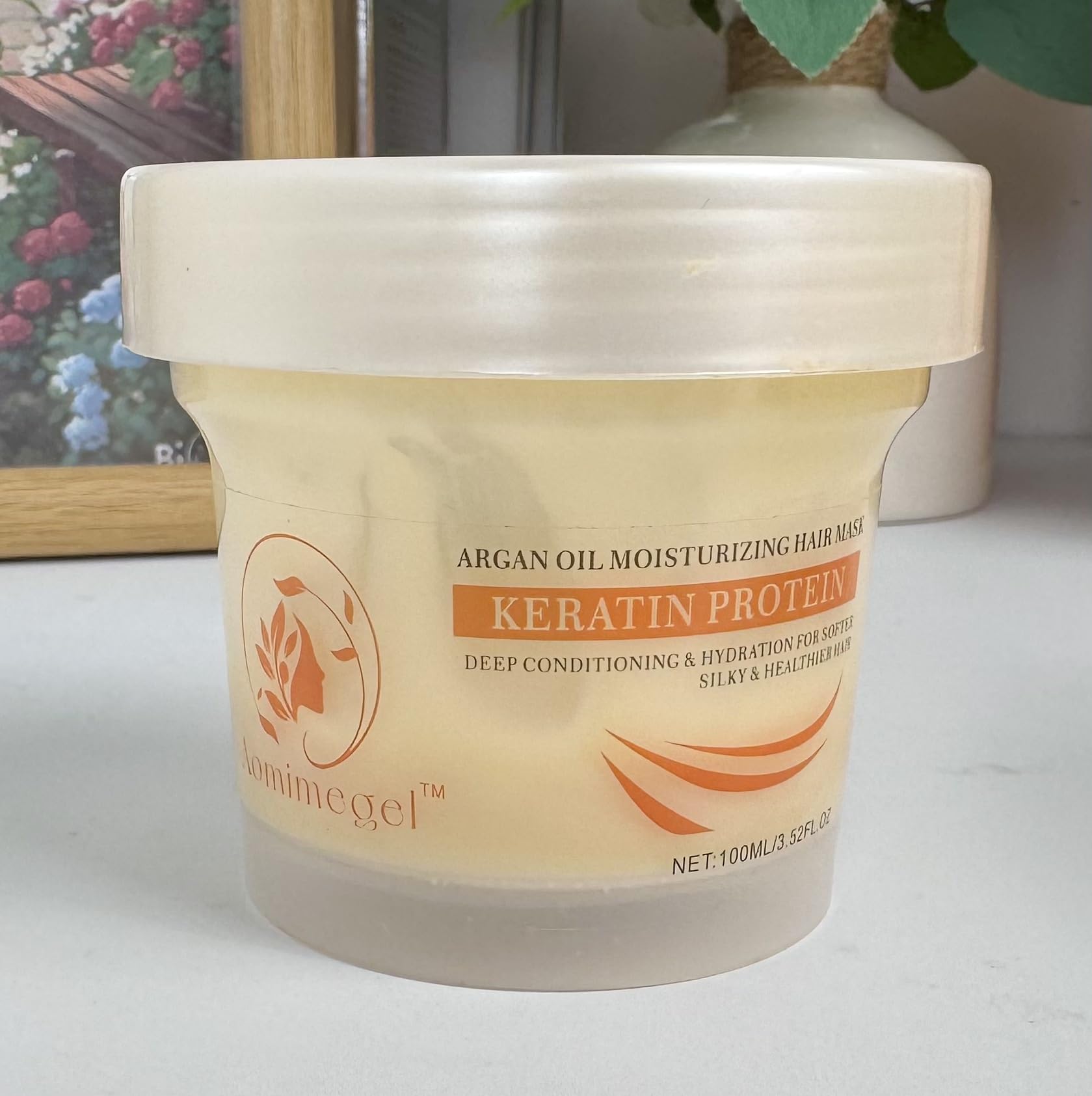 Aomimegel jar in a shower setting illustrating simple weekly routine use