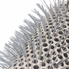 Aozzy ceramic barrel close-up showing even heat surface for faster drying