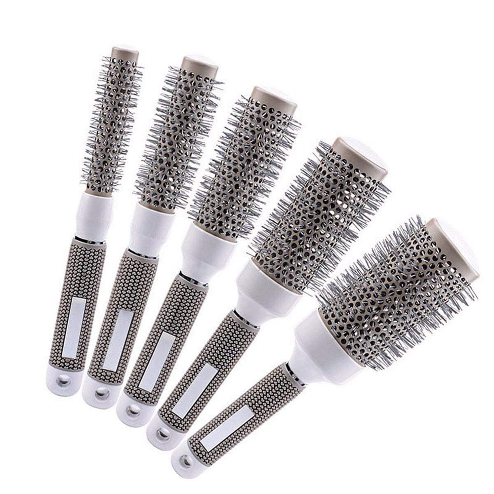 Aozzy brushes beside a ruler to show accurate barrel diameters for styling choices
