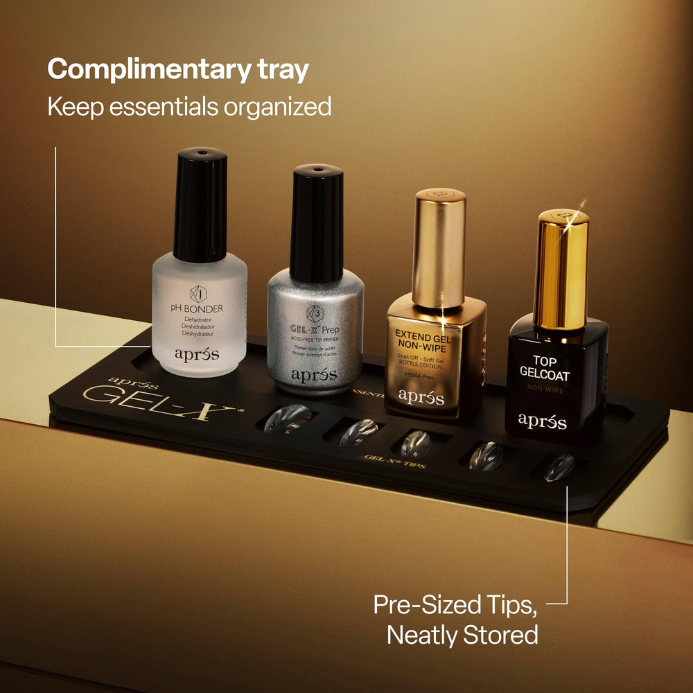 APRÉS kit contents laid out to show all tools and tips for fast sets