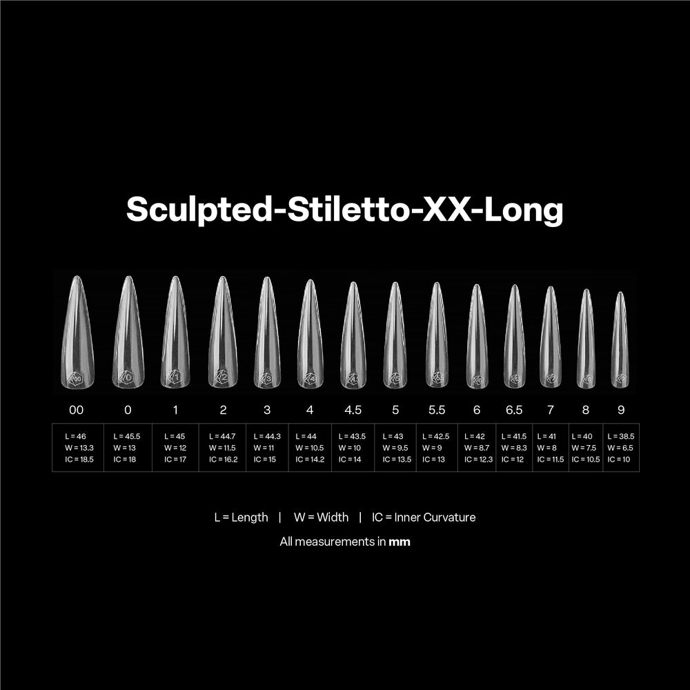 APRÉS tip held in hand showing scale and dramatic extra extra long stiletto benefit