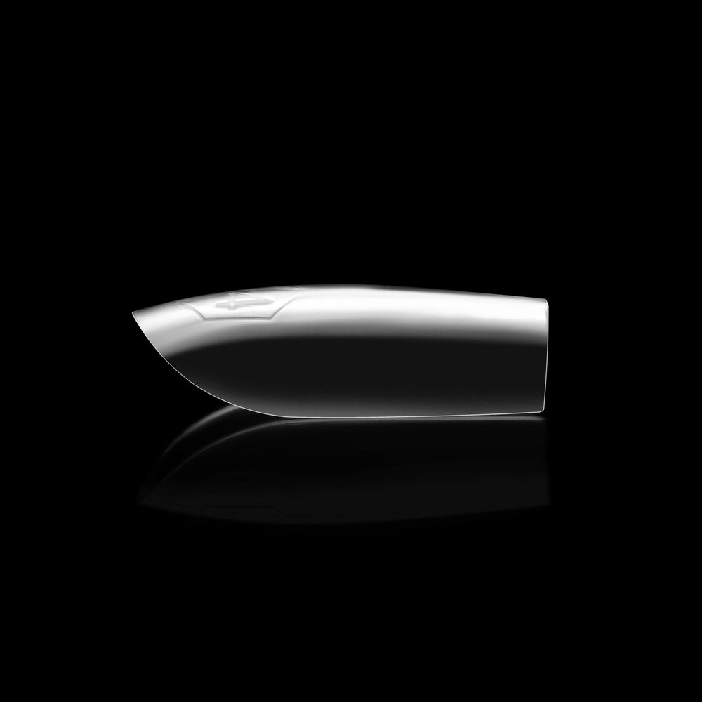 APRÉS Gel-X tips held in hand to show extra short square scale and real-world size