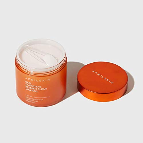 APRILSKIN ingredients display including carrot elements and acids for smoothing
