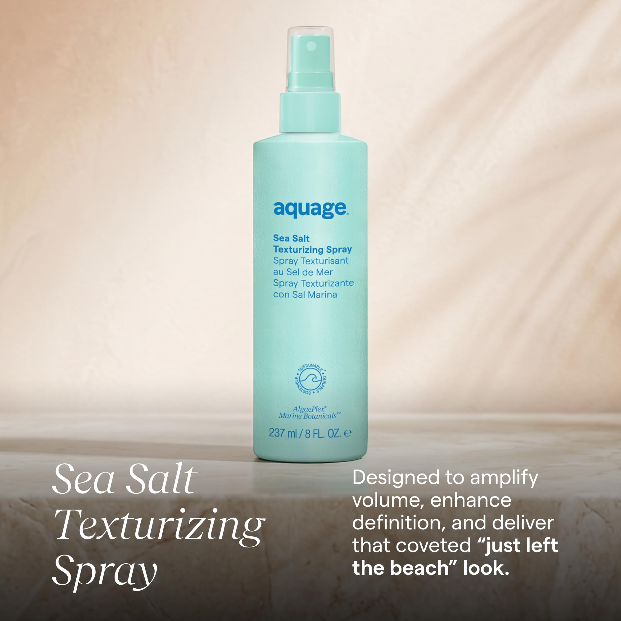 Aquage spray nozzle closeup demonstrating fine mist for even lightweight coverage
