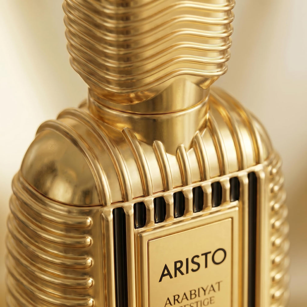 ARABIYAT PRESTIGE bottle in hand indicating portable 3.4 oz convenience