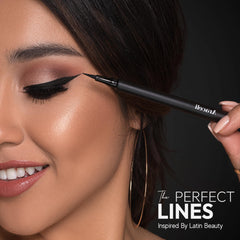 Araceli applicator held between fingers highlighting steady, ergonomic grip