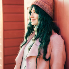 ARCTIC FOX model with prelightened hair showing vivid emerald finish