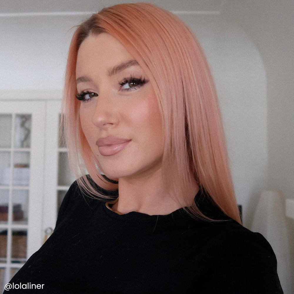 ARCTIC FOX dye applied on platinum blonde strands showing true peach payoff