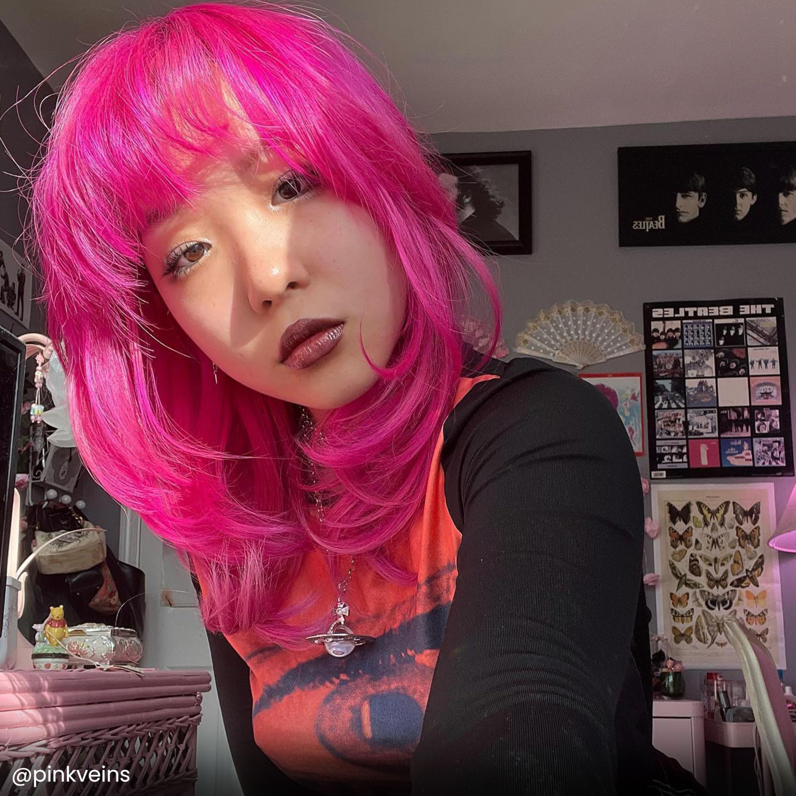 ARCTIC FOX Virgin Pink applied on light blonde hair showcasing true bright magenta