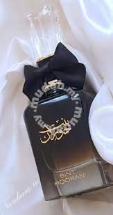 Ard Al Zaafaran bottle staged in evening setting showing sophisticated event-ready benefit