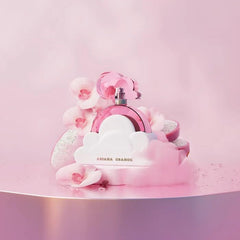 Ariana Grande Cloud Pink ingredient flatlay with dragon fruit and vanilla, scent clarity