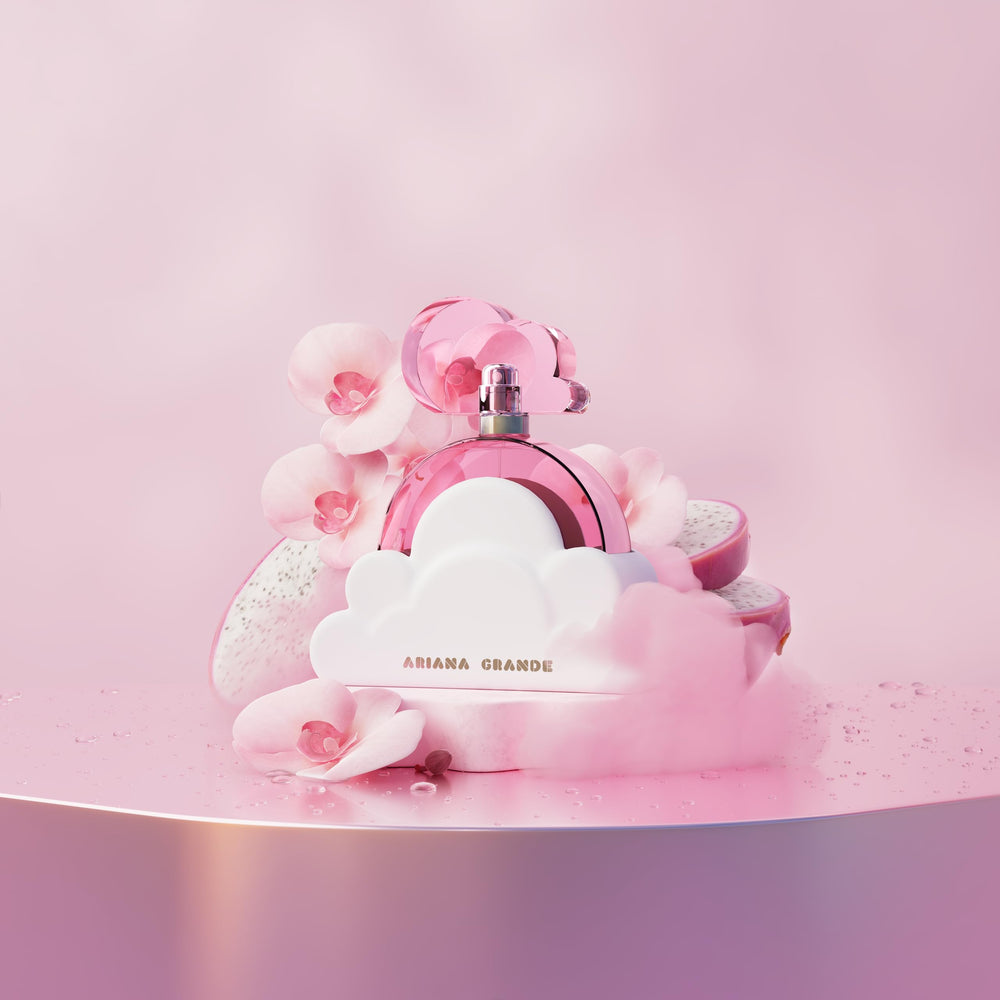 Ariana Grande Cloud Pink 1 fl oz next to a lipstick for scale, ideal travel size