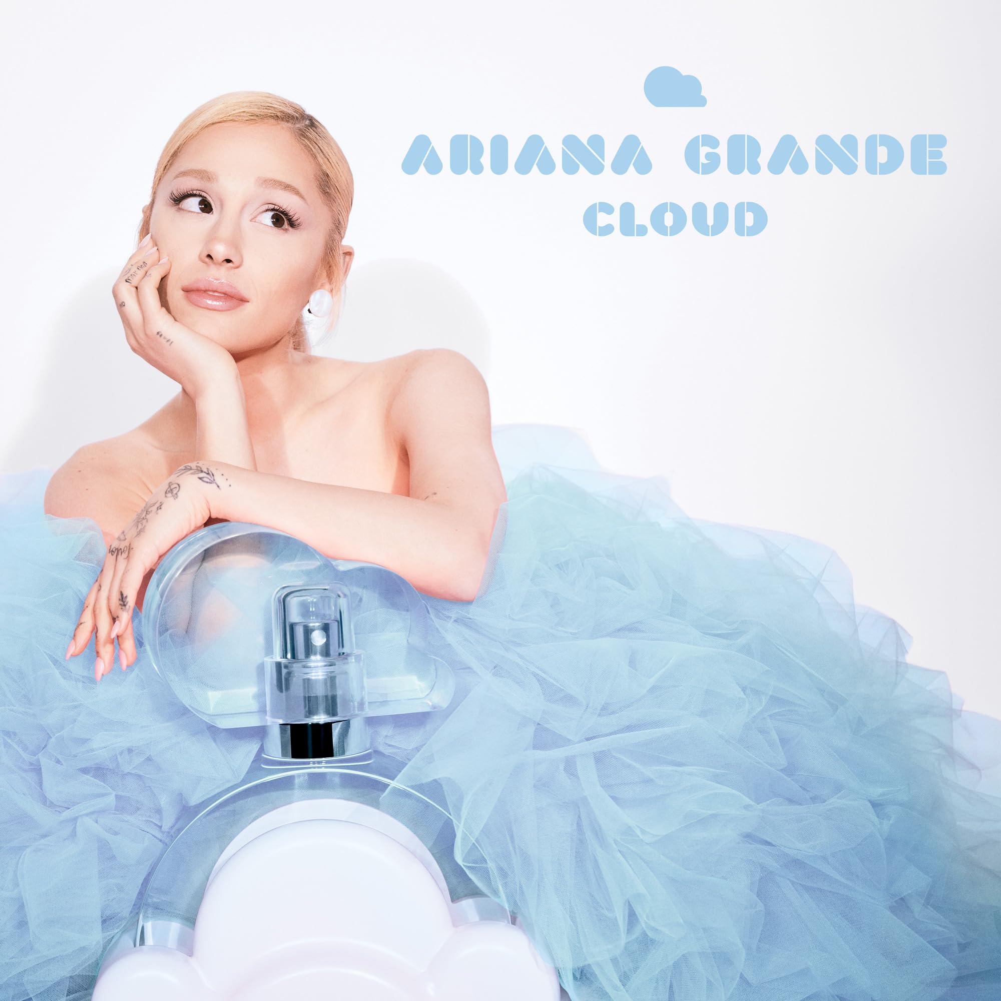 Ariana Grande Cloud styled lifestyle shot conveying cozy optimism and wearable scent