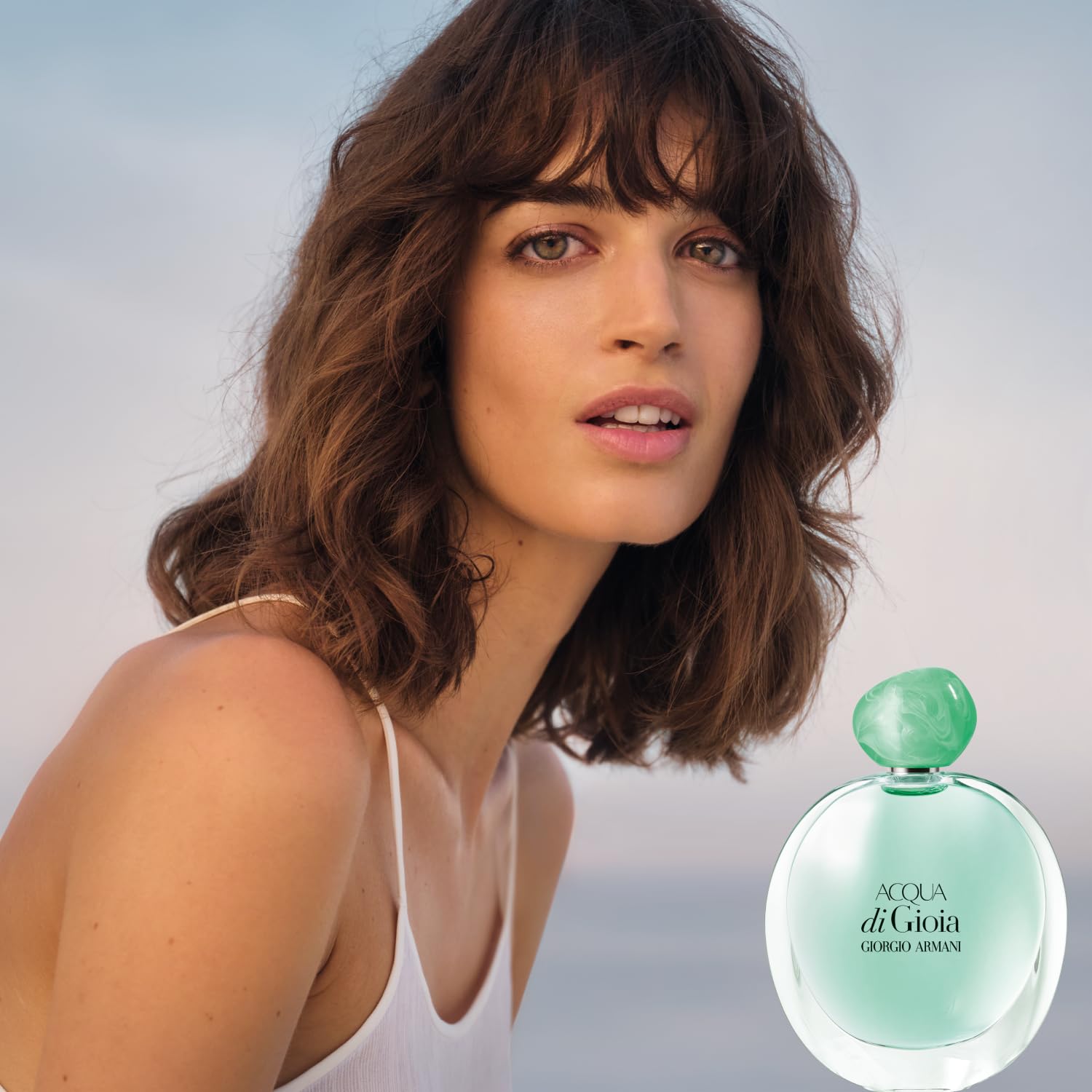 Armani Beauty cap and neck detail highlighting quality finish and secure closure benefit