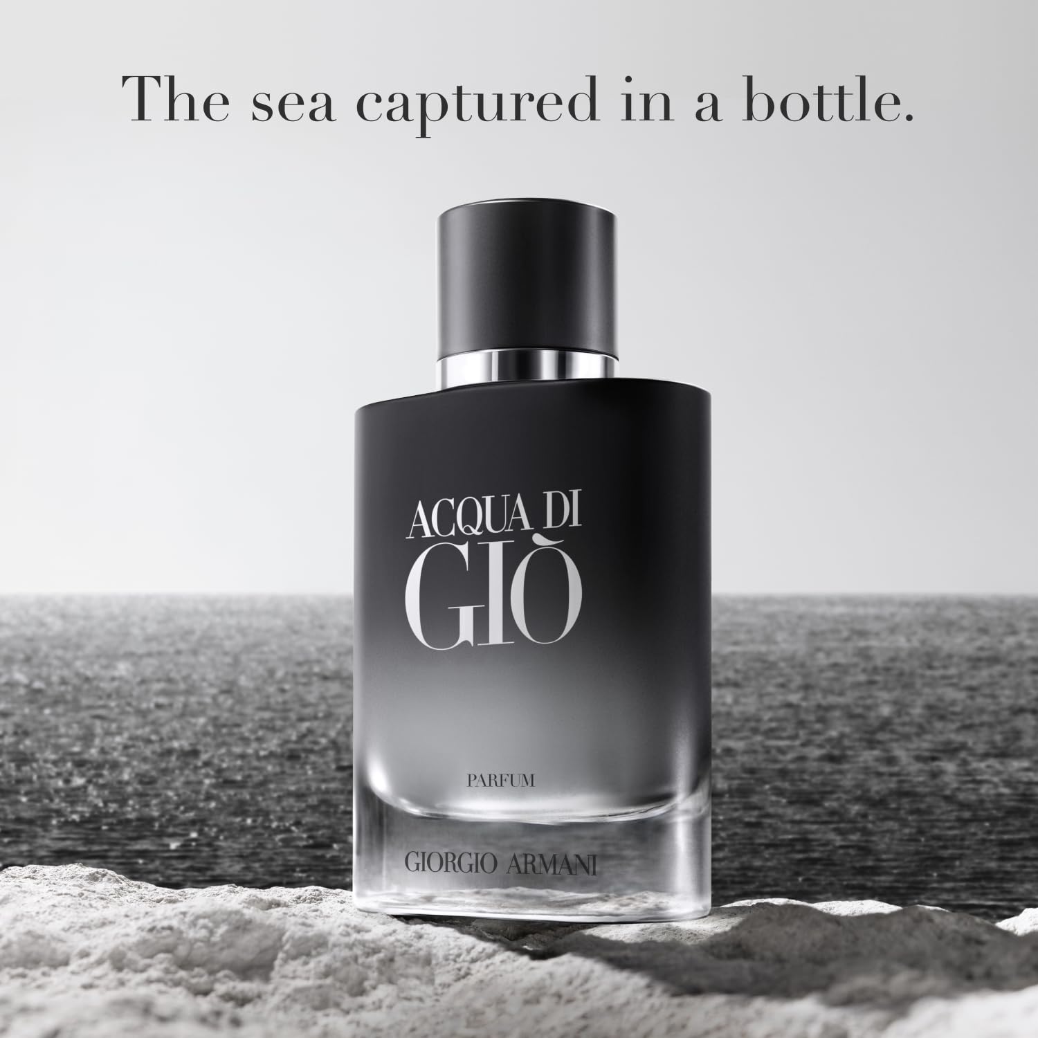 Armani Beauty glass bottle close-up revealing lacquered texture and label