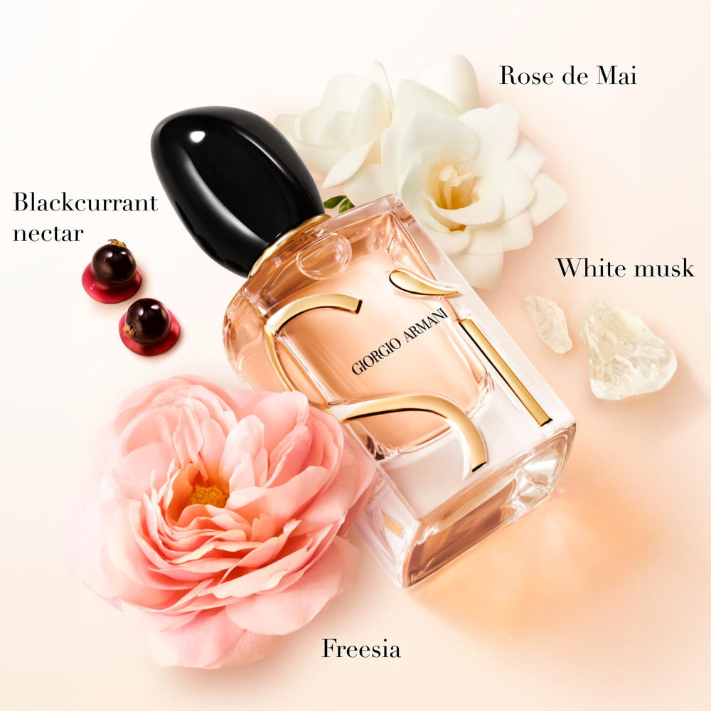 Armani Beauty trio next to passport showing travel-ready sizes and convenience