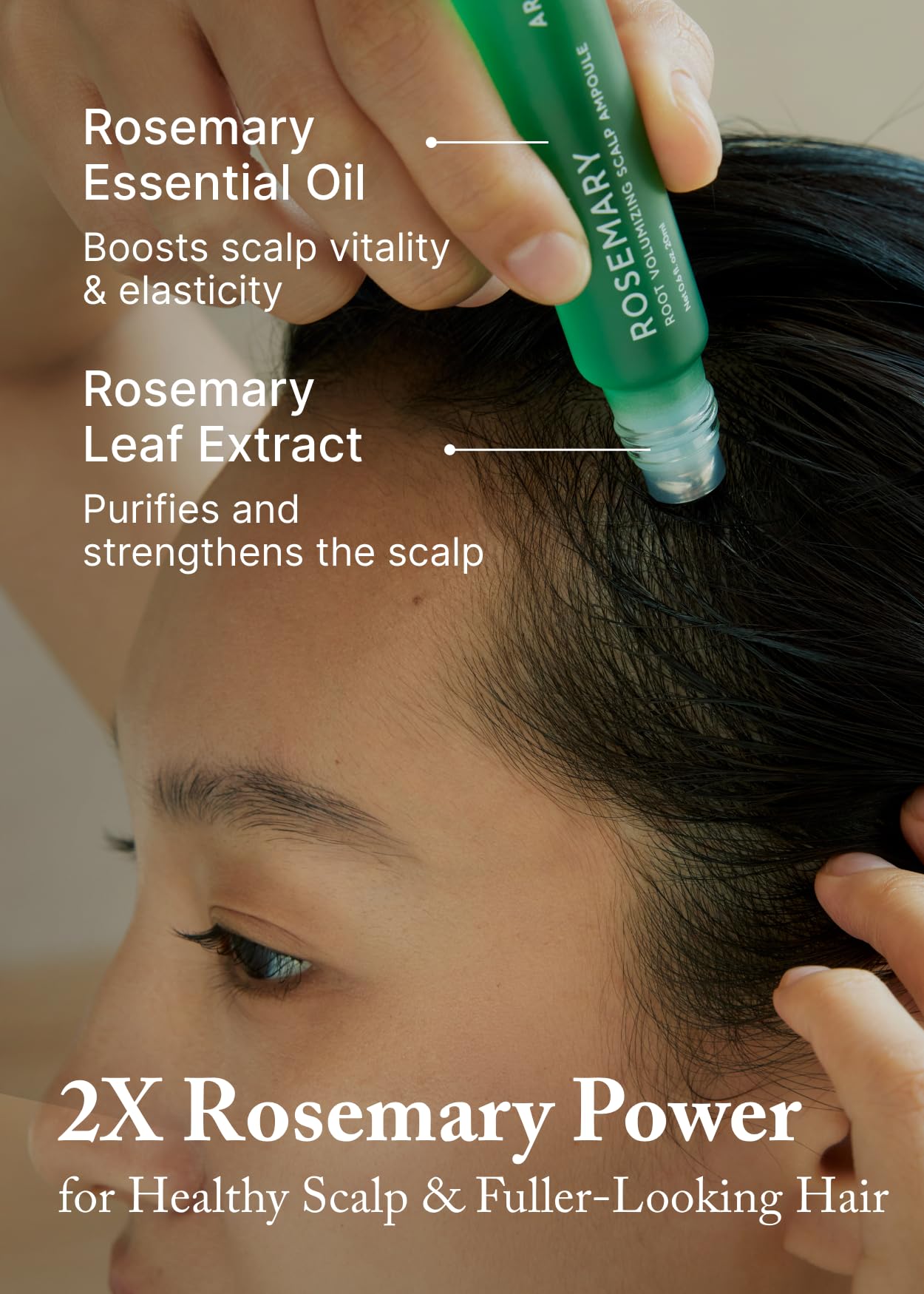 AROMATICA applying roll-on to hair part for targeted root support