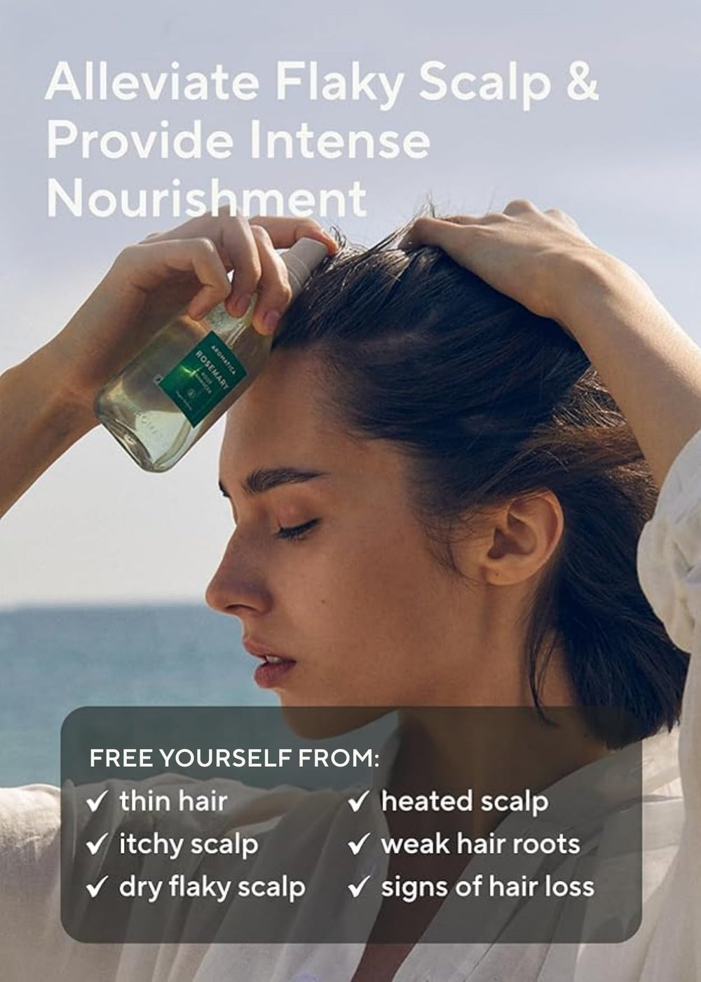 AROMATICA oil drop on fingertip illustrating organic rosemary oil nourishment benefit