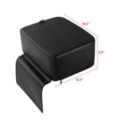Artist hand angled detail highlighting secure fit on barber chair for safer cutting