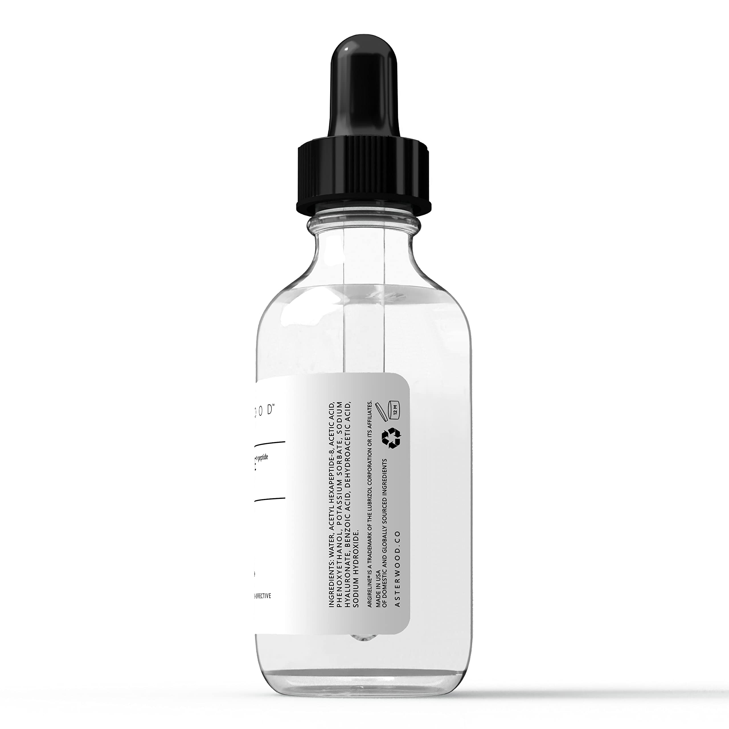 Asterwood bottle next to common items showing 2 fl oz scale