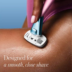 Athena Club razor hanging on magnetic hook for tidy, dry storage benefit