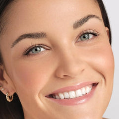ATHLETIC COSMETIC mascara in use during workout demonstrating sweatproof staying power
