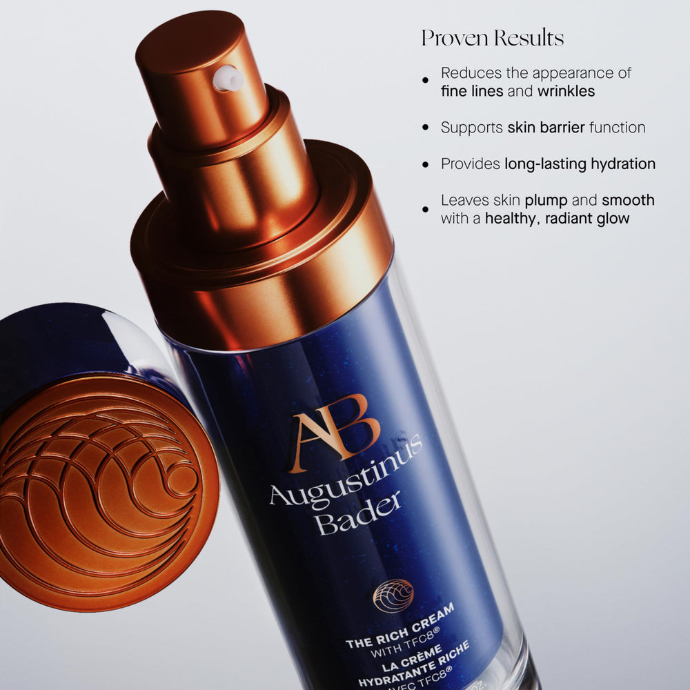 Augustinus Bader cream being applied to hand demonstrating smooth absorption