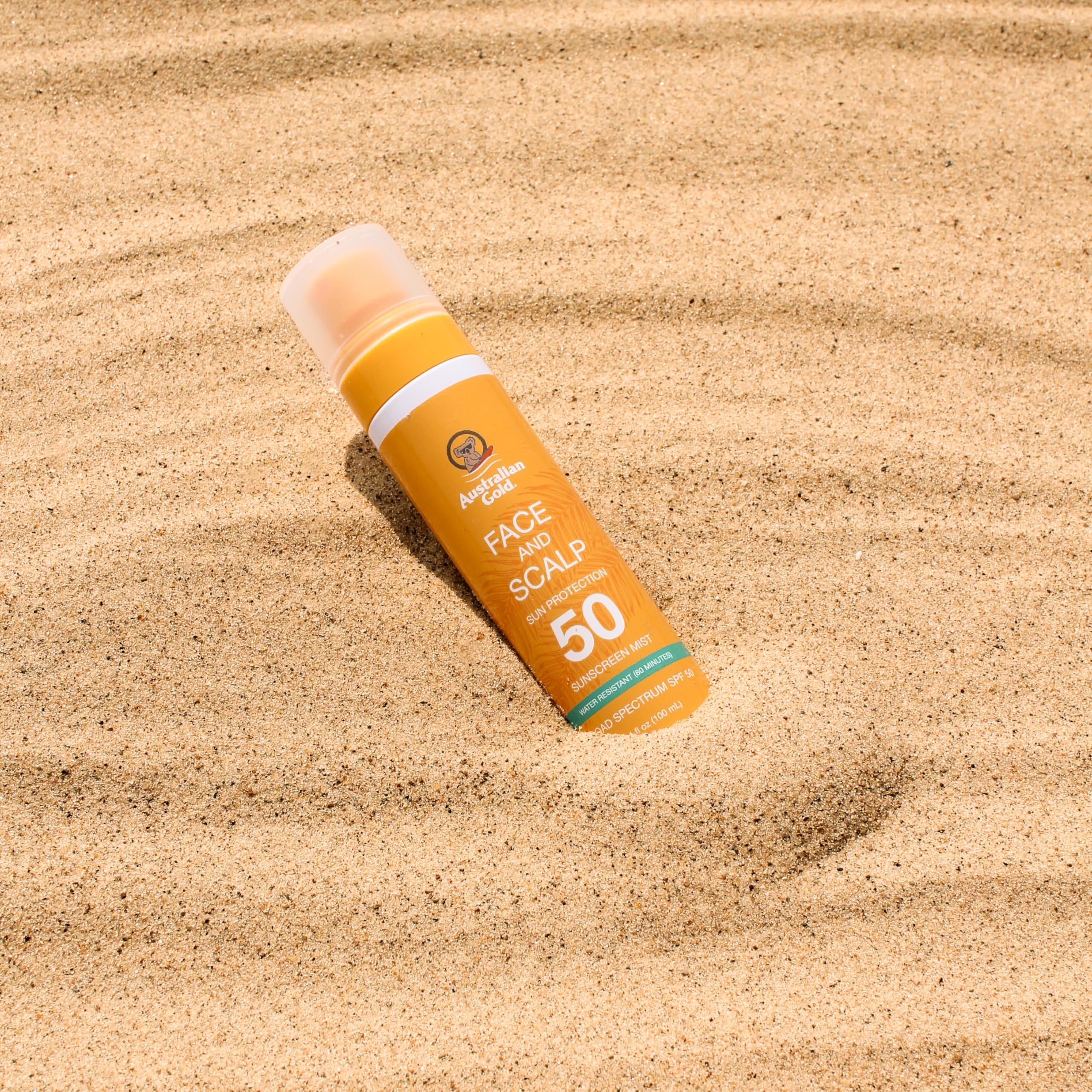 Australian Gold 3.4 fl oz can in a beach bag for on-the-go reapplication convenience