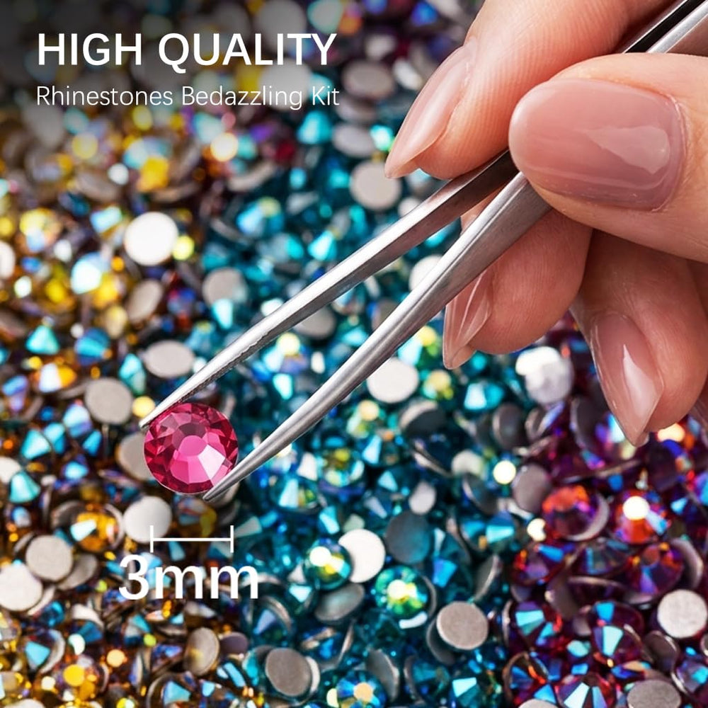 Auxnki rhinestones being placed on a manicure demonstrating precise application benefit